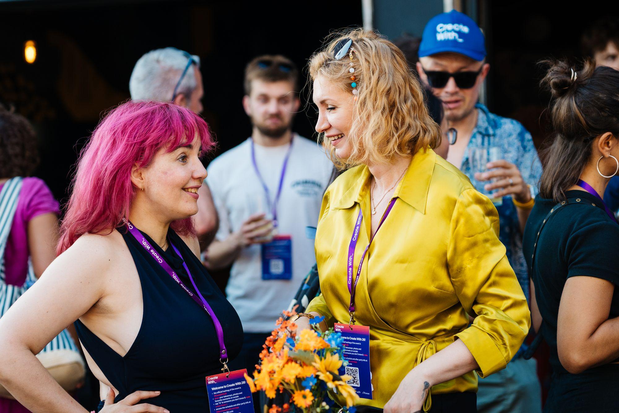Attendees talking at the afterparty