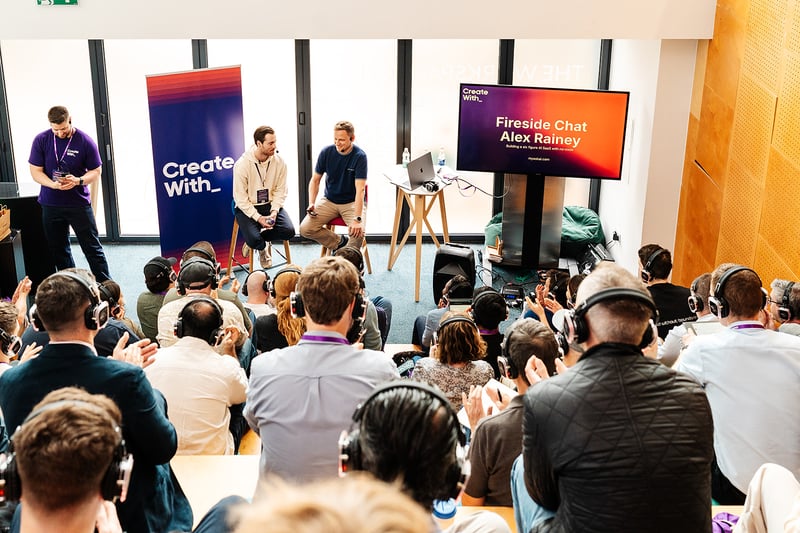 Speaker on main stage at Create With